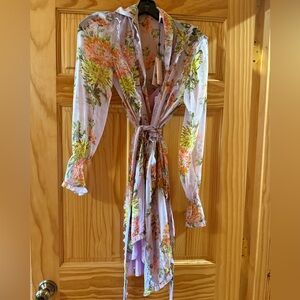 Gorgeous light purple self tie dress with removable slip .